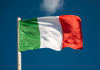 Italian flag against blue sky