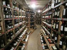 A wine cellar with various French wines