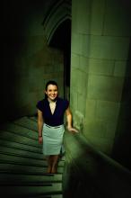 Natalie Downs pictured on staircase in UW's Suzzallo Library