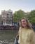 Picture of myself in front of traditional houses in Amsterdam