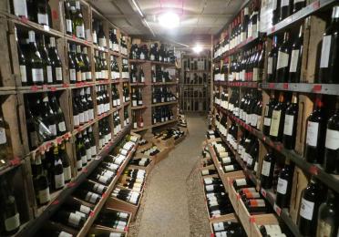 A wine cellar with various French wines